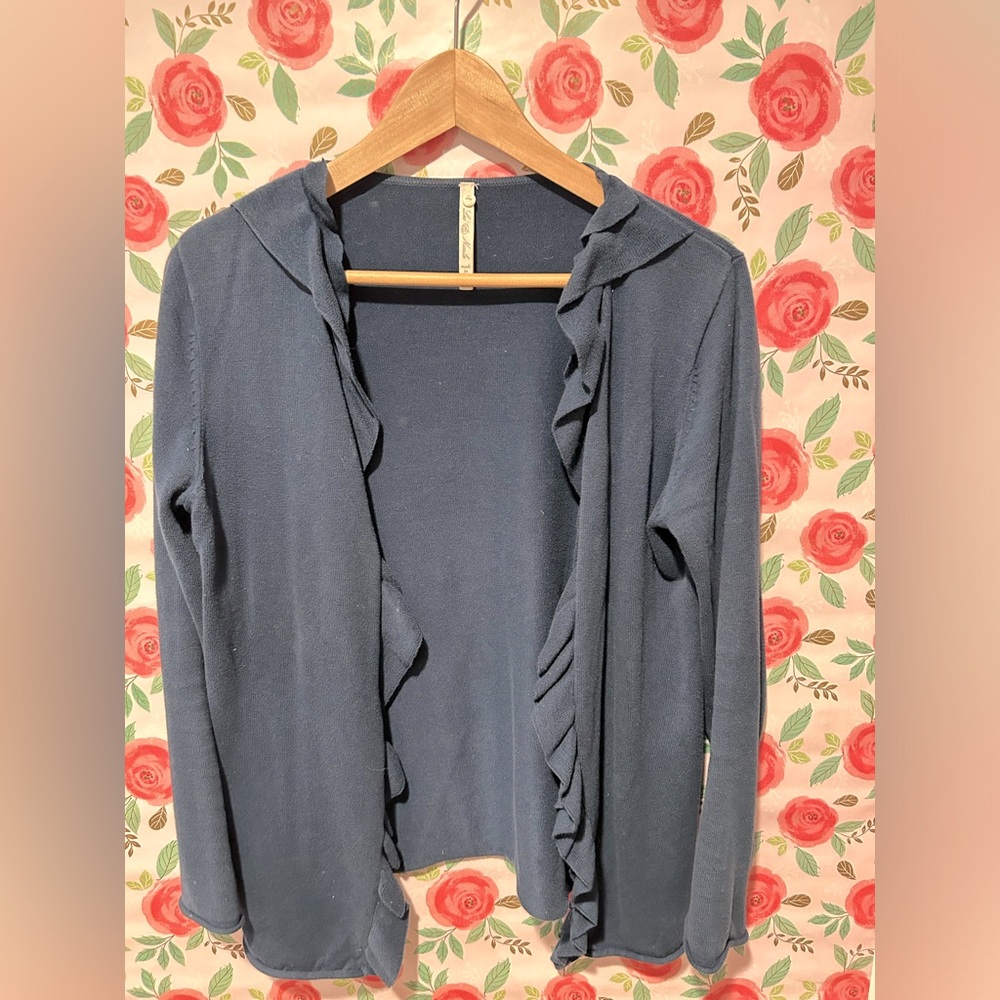 Navy open cardigan sweater with ruffle edges